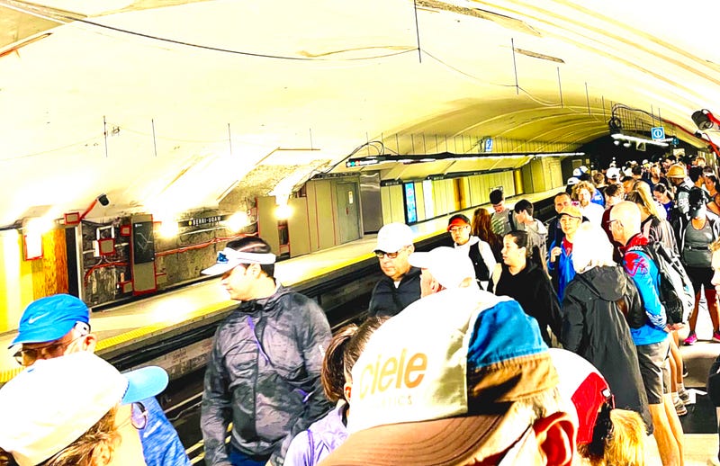 Runners on the metro heading to the marathon.