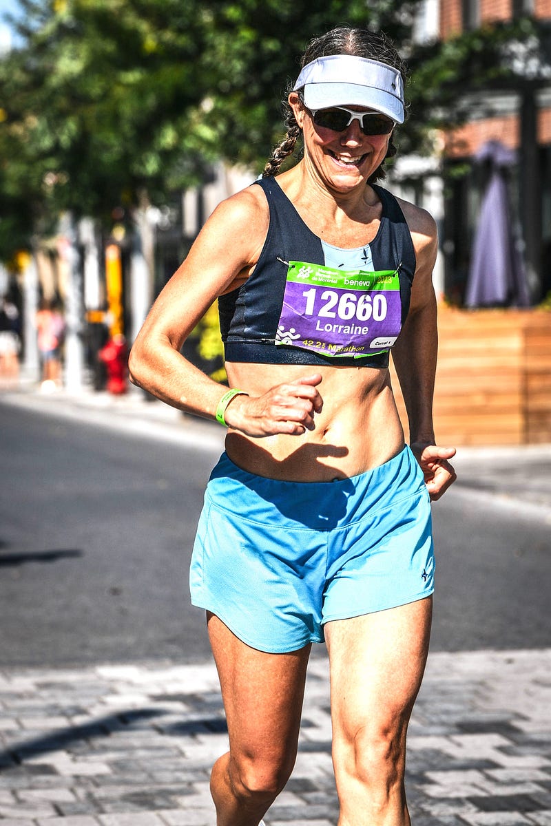 A joyful runner crossing the finish line.