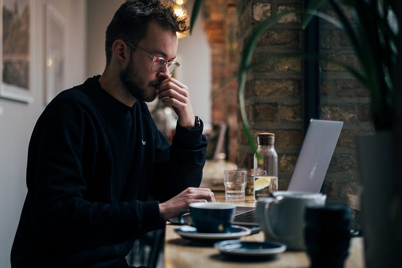 Programmer analyzing code for debugging