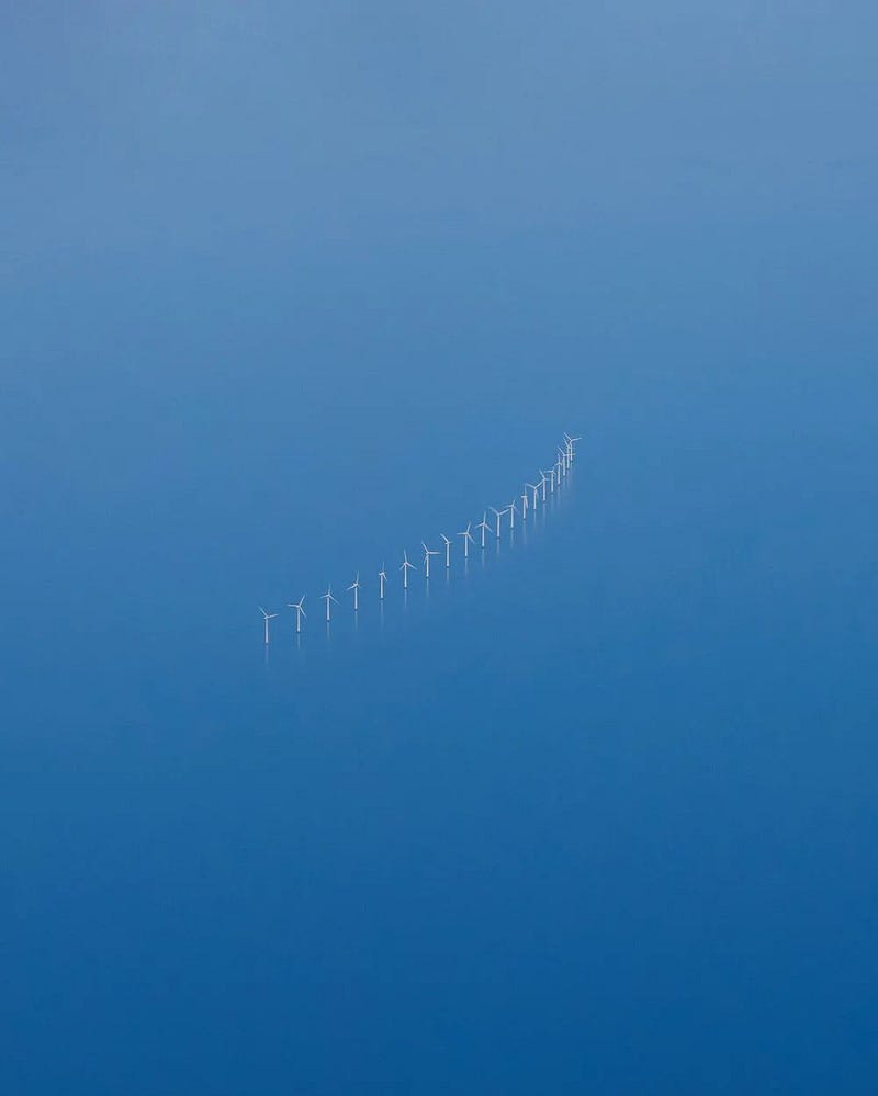 A lone worker surrounded by the vast ocean.